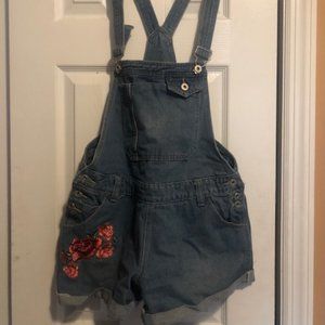 Short Overalls with floral accent.
